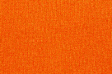 Orange fabric cloth texture background, seamless pattern of natural textile.