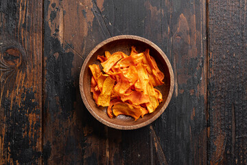 Dried carrot chips, vegan food, background, top view