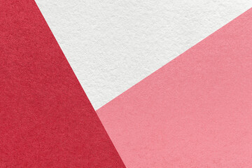 Fototapeta premium Texture of craft white, red and pink color paper background, macro. Vintage wine abstract cardboard with gradient.