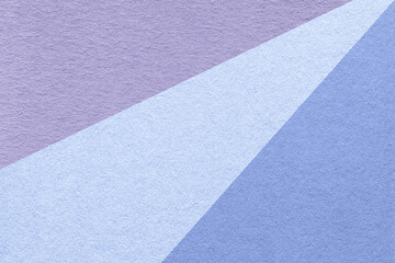 Texture of old craft light blue, very peri and violet color paper background. Vintage abstract lavender cardboard