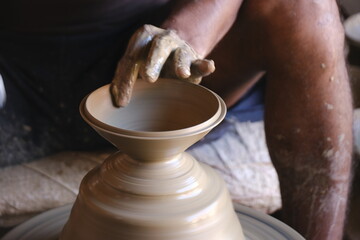 9 October 2022, Pune, India, Indian potter making Diya (oil lamps) or earthen lamps for Diwali Festival with clay, Handwork craft.