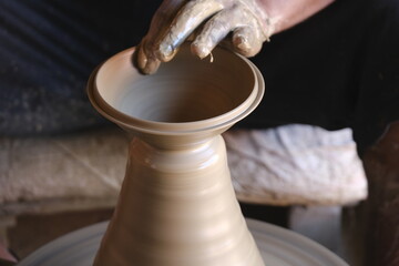 9 October 2022, Pune, India, Indian potter making Diya (oil lamps) or earthen lamps for Diwali Festival with clay, Handwork craft.