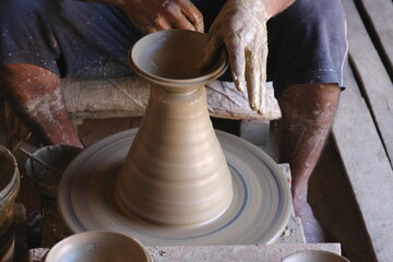 9 October 2022, Pune, India, Indian potter making Diya (oil lamps) or earthen lamps for Diwali Festival with clay, Handwork craft.