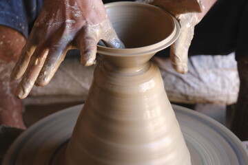 9 October 2022, Pune, India, Indian potter making Diya (oil lamps) or earthen lamps for Diwali Festival with clay, Handwork craft.