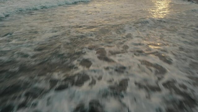 Low Fly Over Breaking Foamy Waves During Dusk At El Pared&oacute;n Buena Vista, Escuintla, Guatemala. Aerial Drone Shot