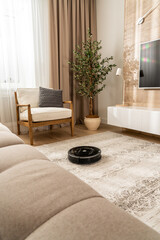 Modern living room with a robotic vacuum cleaner