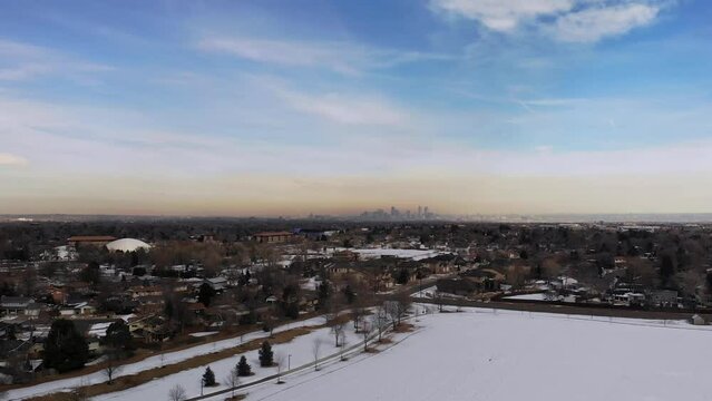 Smog Over Downtown Denver • Snowy Park in Western Metro Suburbs • Dramatic Aerial Drone Footage