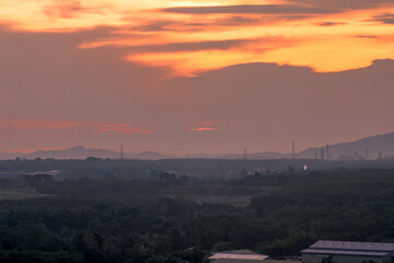 High angle nature background on the mountain overlooking the evening sky changing colors at night, with the blur of the wind and the passing leaves, seen at various tourist spots and viewpoints.