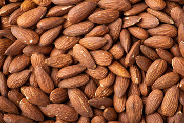 Flat lay background of almond nuts. Fresh tasty almonds ready to be eaten