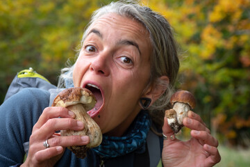 Female mushroom forager with wild Cèpe - Boletus edulis