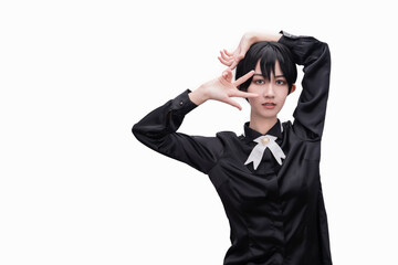 A girl dressed in black against a white background