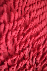 the unique texture of the red mat