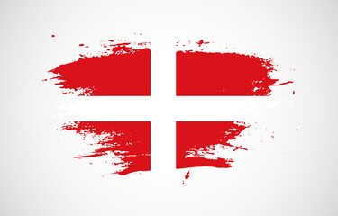 Grunge brush stroke with the national flag of Sovereign Military Order of Malta on a white isolated background