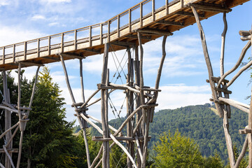 Observation tower located at the top of the Slotwiny Arena ski station, leading in the treetops, Krynica Zdroj, Beskid Mountains, Slotwiny, Poland
