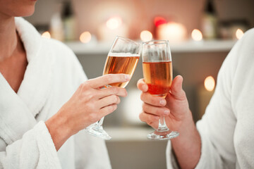 Couple, champagne toast or luxury spa date in marriage success, birthday celebration or holiday travel. Zoom, hands or love man or woman with wine alcohol in relax salon or wellness honeymoon bonding - Powered by Adobe