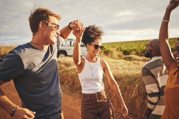 Friends, road trip and dance with a man and woman on a vacation, holiday or getaway in the dessert...