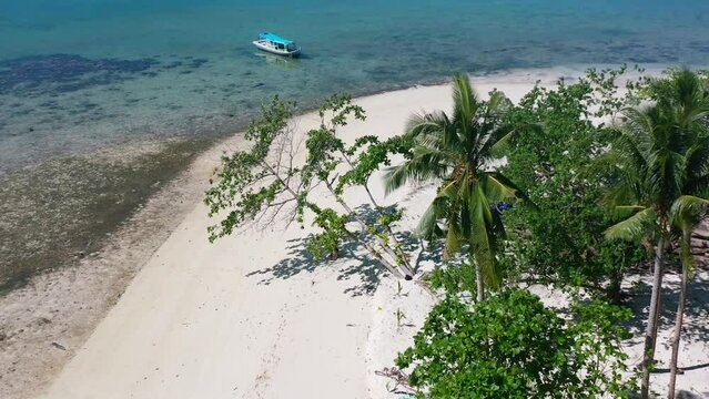 aerial of traditional indonesian boat anchored on remote island in belitung