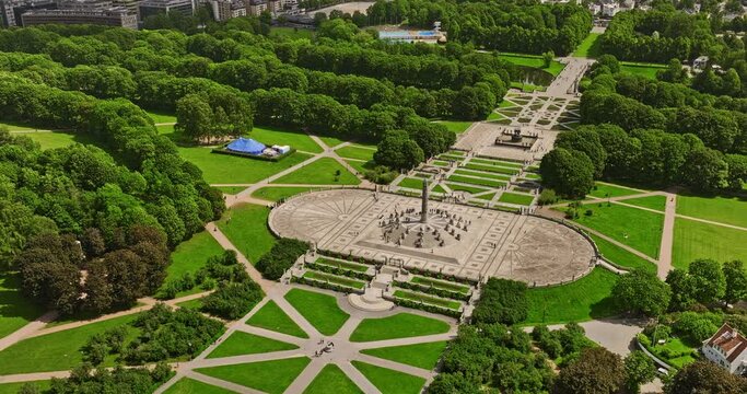 Oslo Norway v45 cinematic birds eye view flyover frogner park, pull out away from monolitten sculpture, reveals the view of grand urban greenery and cityscape - Shot with Mavic 3 Cine - June 2022