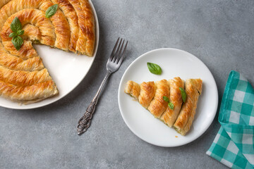 Spanakopita, greek phyllo pastry pie with spinach and feta cheese filling. Delicious handmade pies. Turkish name; el acmasi borek, rulo borek