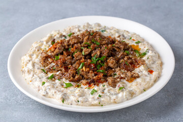 Turkish Ali Nazik Kebab with Yogurt, Minced Meat and Roasted Eggplant or Aubergine Kebap.