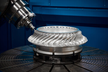 Making turbine wheel with robotized lathe machine at plant