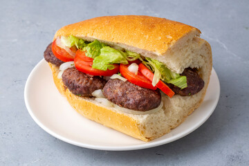 Delicious Turkish Meatballs Sandwich, Kofte Ekmek. Turkish name; kofte ekmek or ekmek arasi kofte
