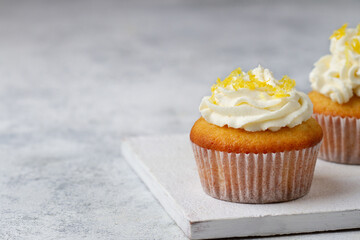 Cupcake with lemon close up, copy space