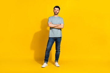Fototapeta na wymiar Full length photo of good looking serious man employer company owner dressed stylish outfit arm folded isolated on yellow color background