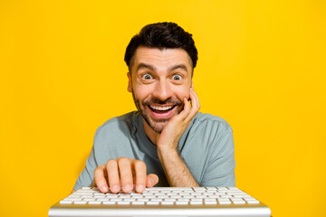 Closeup photo of excited crazy unexpected reaction brunet guy open mouth addicted typing keyboard...