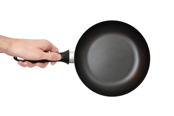 Man is holding an small empty black frying pan. Isolated on a white background. Top view. Clipping path.