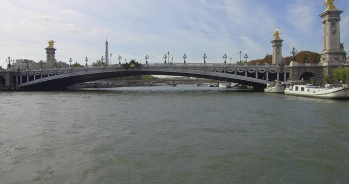 Passing under the Pont Alexandre III in Paris