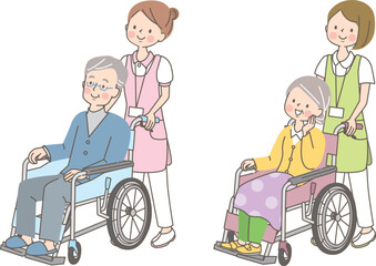 車椅子のシニア男女を介助する若い女性介護士
