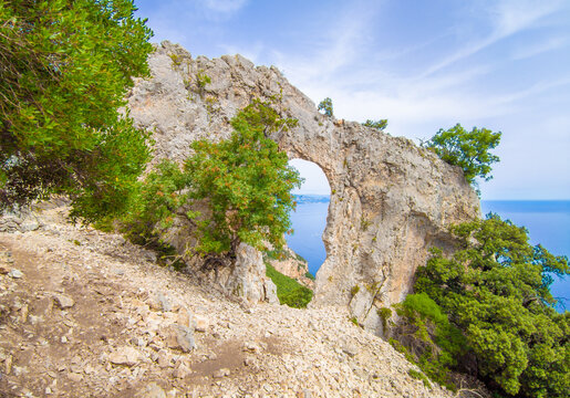 Cala Mariolu in Sardegna, Italy (Italy) - The famous touristic attraction in wild east coast of Sardinia island, Orosei gulf in the Baunei municipal, with wonderful beach, sea and trekking path.