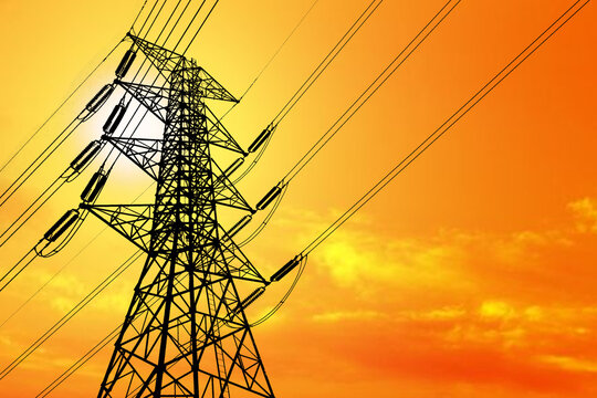 Silhouette of high voltage power poles. electric power security concept