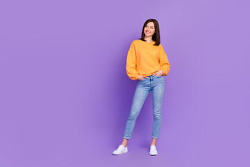 Photo of adorable pretty positive lady dressed stylish clothes hand pocket interested look empty...