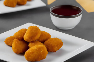 picture of chicken nuggets, made of processed meat, a tasty fast food, savory