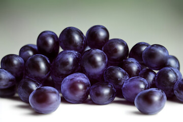 a picture of black grapes, juicy and healthy fruit