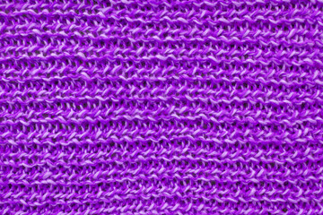 Background of purple and white knitted fabric