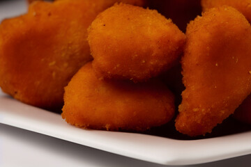 picture of chicken nuggets, made of processed meat, a tasty fast food, savory