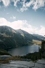 Fototapeta premium Beautiful lake in the mountains. Morskie Oko pond in the Tatra Mountains, Poland, Europe. Concept of the destination traveling ideal resting place.