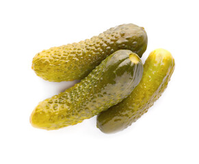 Tasty crunchy pickled cucumbers on white background, top view