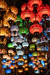 Oriental colorful glass hanging lamps or lanterns in turkish bazaar