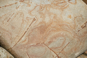 Beach stone texture from Santa Barbara California. Natural beige and orange high quality background