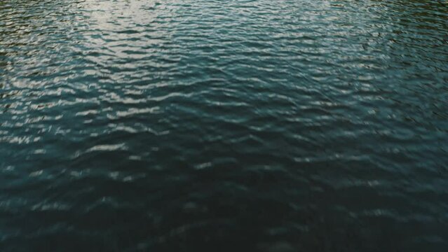 Ripples Of The River In El Paredon, Guatemala - drone shot