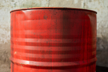 Red barrel for fuel. Oil barrel from stock. Steel tank.