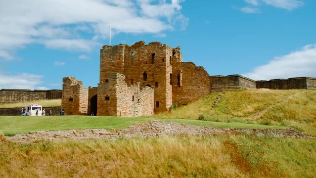 Establishing shot of the Tynemouth Priory and Castle, once one of the largest fortified areas in Northumberland, England, UK