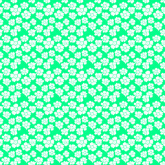 Seamless vector line art pattern made of white blooming flowers on green