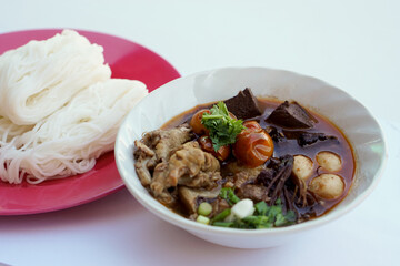 Rice noodles soup or Kanom Jeen Nam Ngeaw, Thai northern traditional food on dish. Concept : Local  healthy food in north of Thailand, popular menu.       