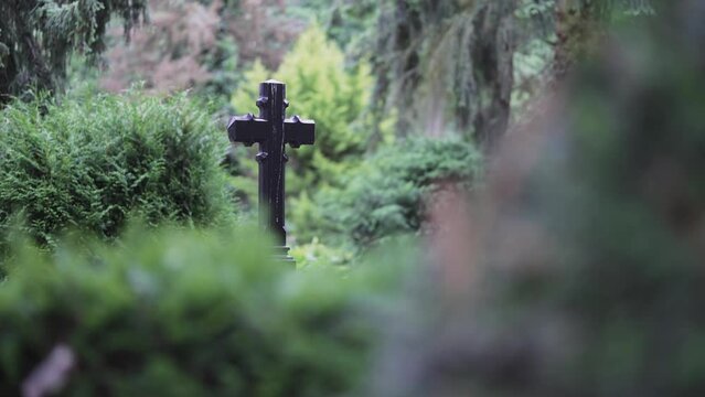 Cross on grave at cemetery Melaten Friedhof in Cologne, Germany