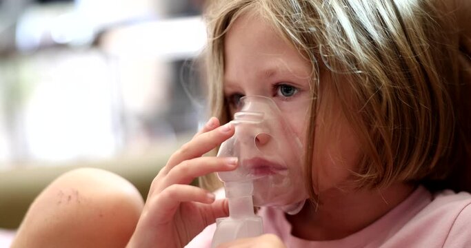 Little sick girl making inhalation of hormonal drug 4k movie slow motion 